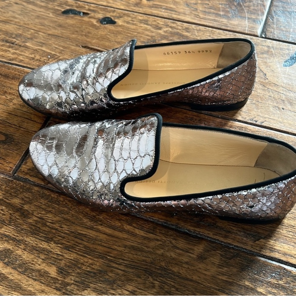 Giuseppe’s snakeskin flats